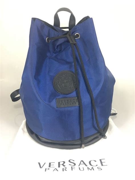 blue and black versace backpack|versace perfume with free backpack.